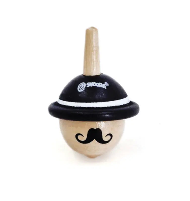The Sir is a wooden spinning top featuring a painted black hat, mustache, white accents, and natural wood finish—ideal for helping children develop fine motor skills. Shown upright on a white background.