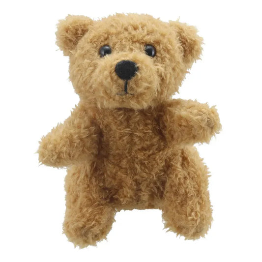 The Puppet Company Teddy Bear Finger Puppet is a small, fluffy bear with light brown fur, black button eyes, and a black nose, sitting upright on a plain white background—ideal for storytime adventures.