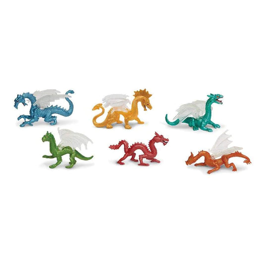 A set of puppet show figurines featuring dragons on a white background.
