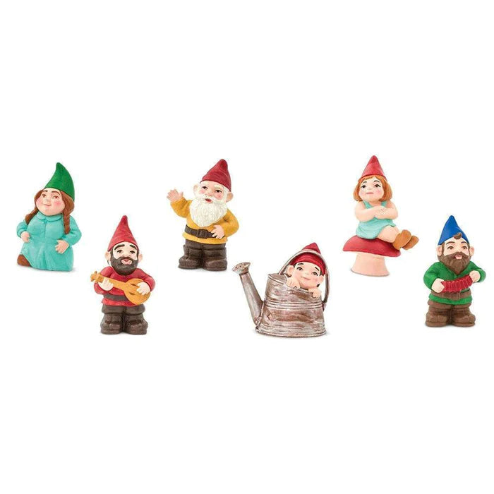 A whimsical gnome family from the TOOBS® Figurines collection, perfect for puppet shows and entertaining kids.
