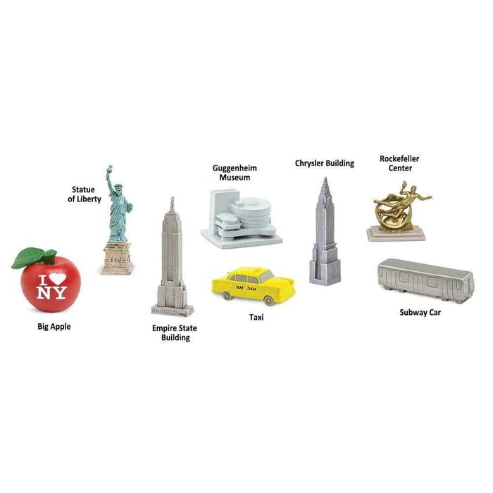 A set of TOOBS® Figurines New York City featuring the statue of liberty and a yellow taxi, perfect for puppet shows or entertaining kids.