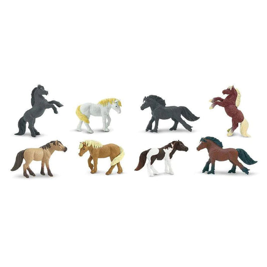 A group of puppet-like Figurines Ponies on a white background for kids' puppet shows.