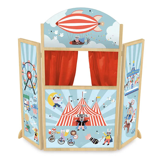 Introducing the Vilac Circus Theater, a vibrant puppet theater designed for children ages 3 years and up. This wooden toy features beautifully illustrated panels depicting circus animals and attractions such as a ferris wheel and big top tent. The center panel includes an opening adorned with charming red curtains, perfect for creating magical puppet shows.