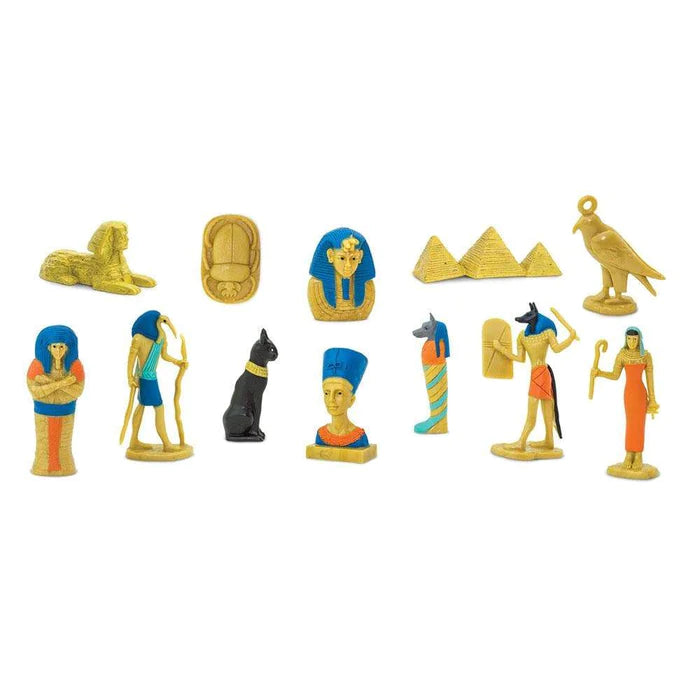 A collection of kids' ancient Egypt puppet figurines on a white background.