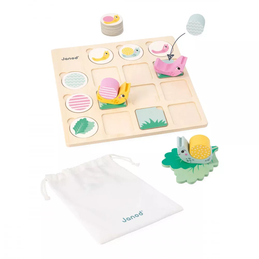 A Janod Double Entry Table Snails set with a bag and accessories.