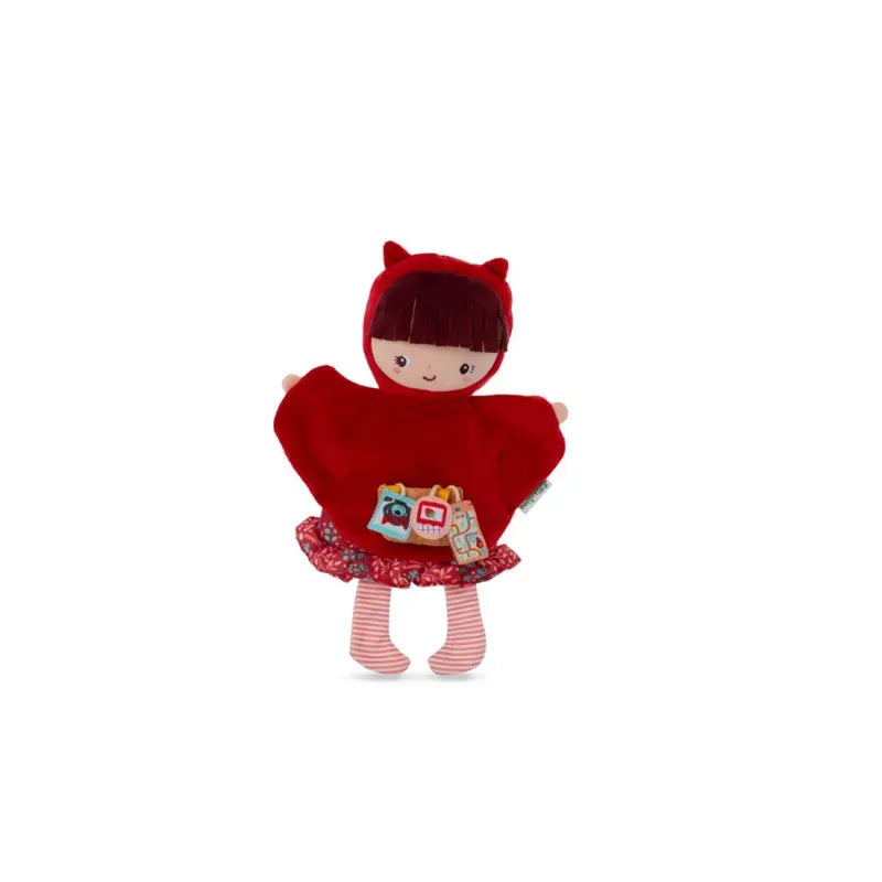 A Lilliputiens Red Riding Hood Handpuppet dressed in a red hooded cape with cat ears, a patterned skirt, and red and white striped leggings. The smiling face invites young children to imaginative and creative play, while small embroidered details like a house and trees on its cape evoke the charm of Little Red Riding Hood.